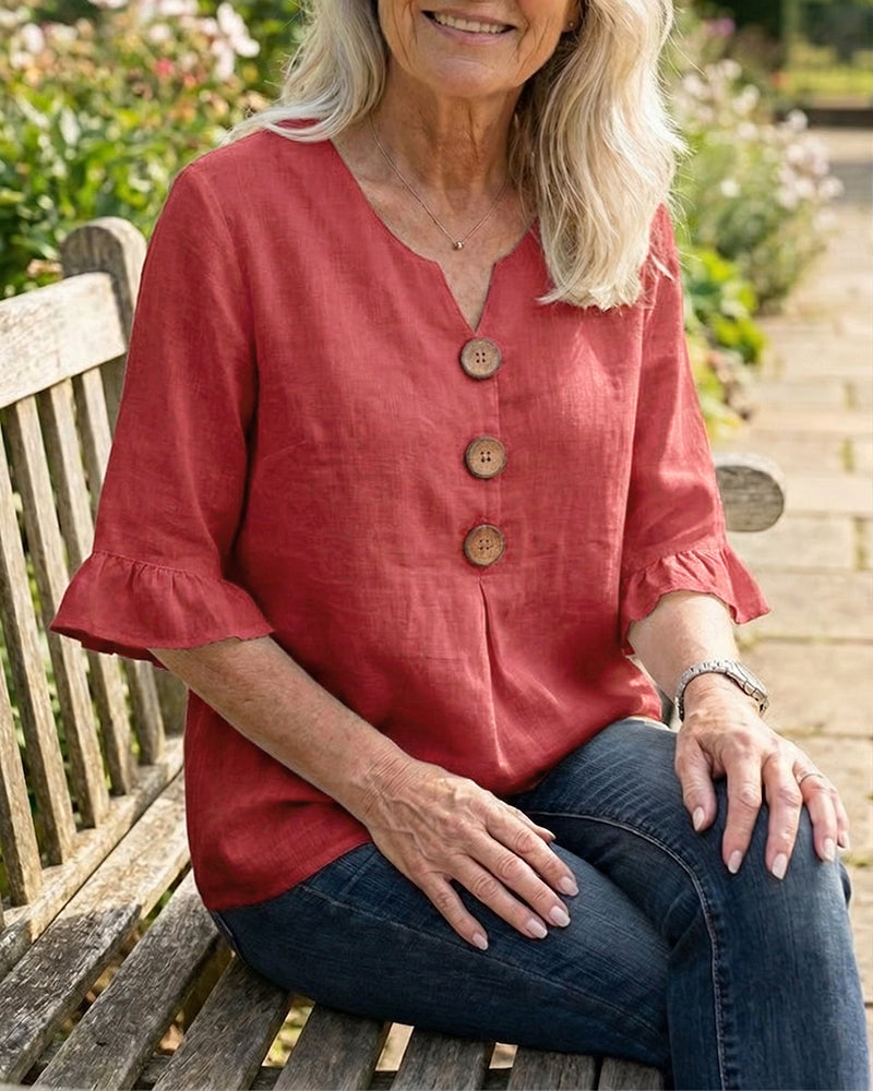 ROSARIO | Blusa lisa de algodón y lino con botones de madera y volantes