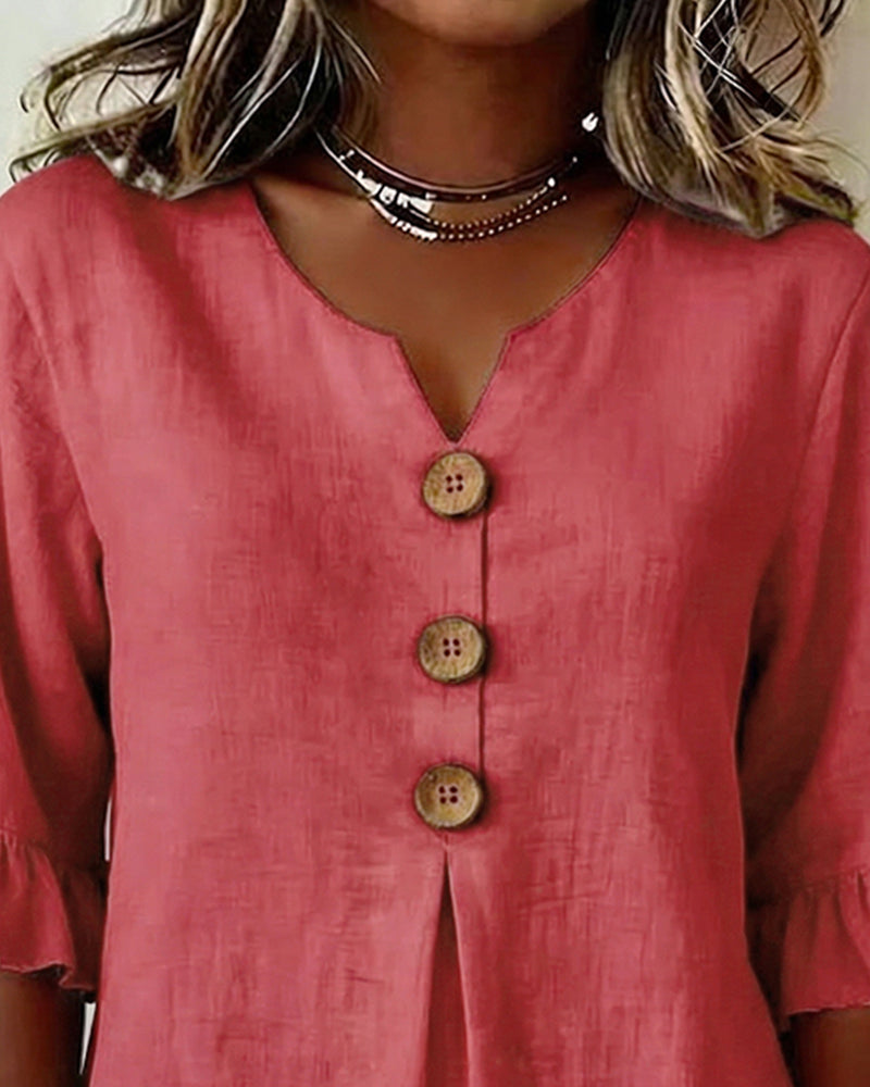 ROSARIO | Blusa lisa de algodón y lino con botones de madera y volantes