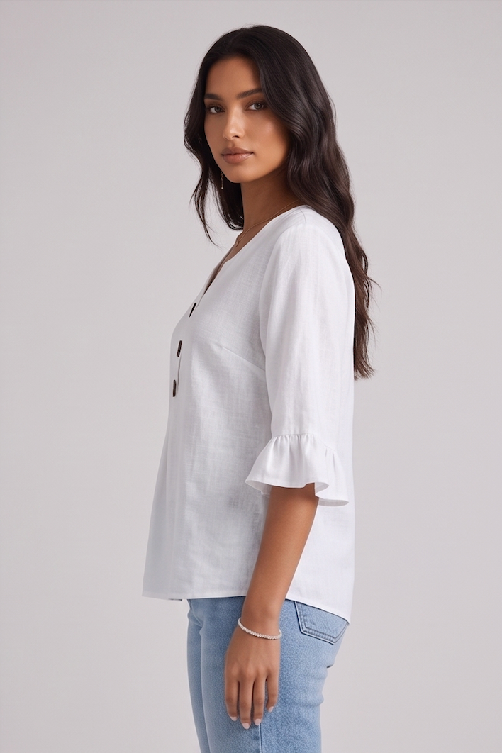 ROSARIO | Blusa lisa de algodón y lino con botones de madera y volantes