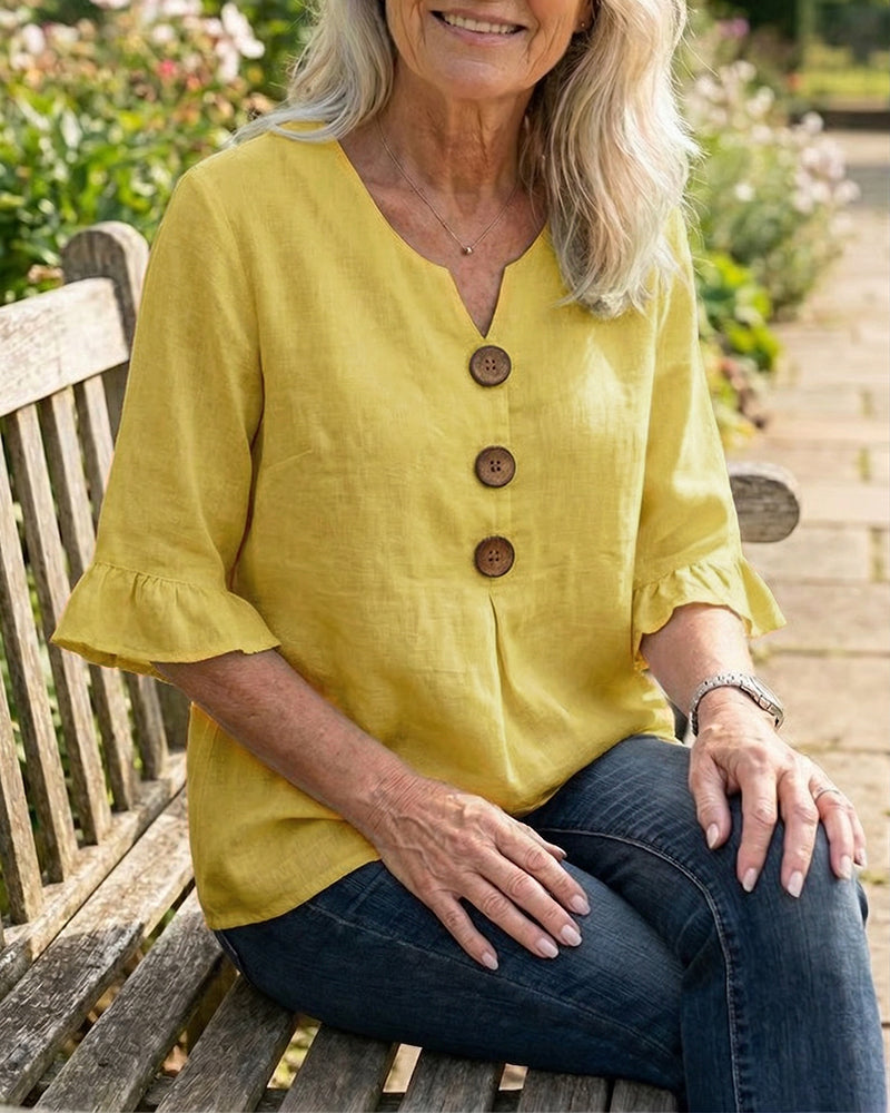 ROSARIO | Blusa lisa de algodón y lino con botones de madera y volantes