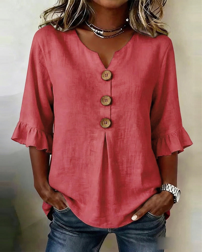ROSARIO | Blusa lisa de algodón y lino con botones de madera y volantes